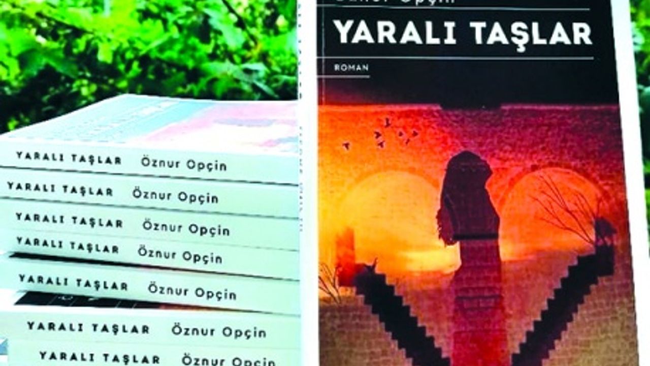 YAZAR ÖZNUR OPÇİN “YARALI TAŞLAR” ÇIKTI