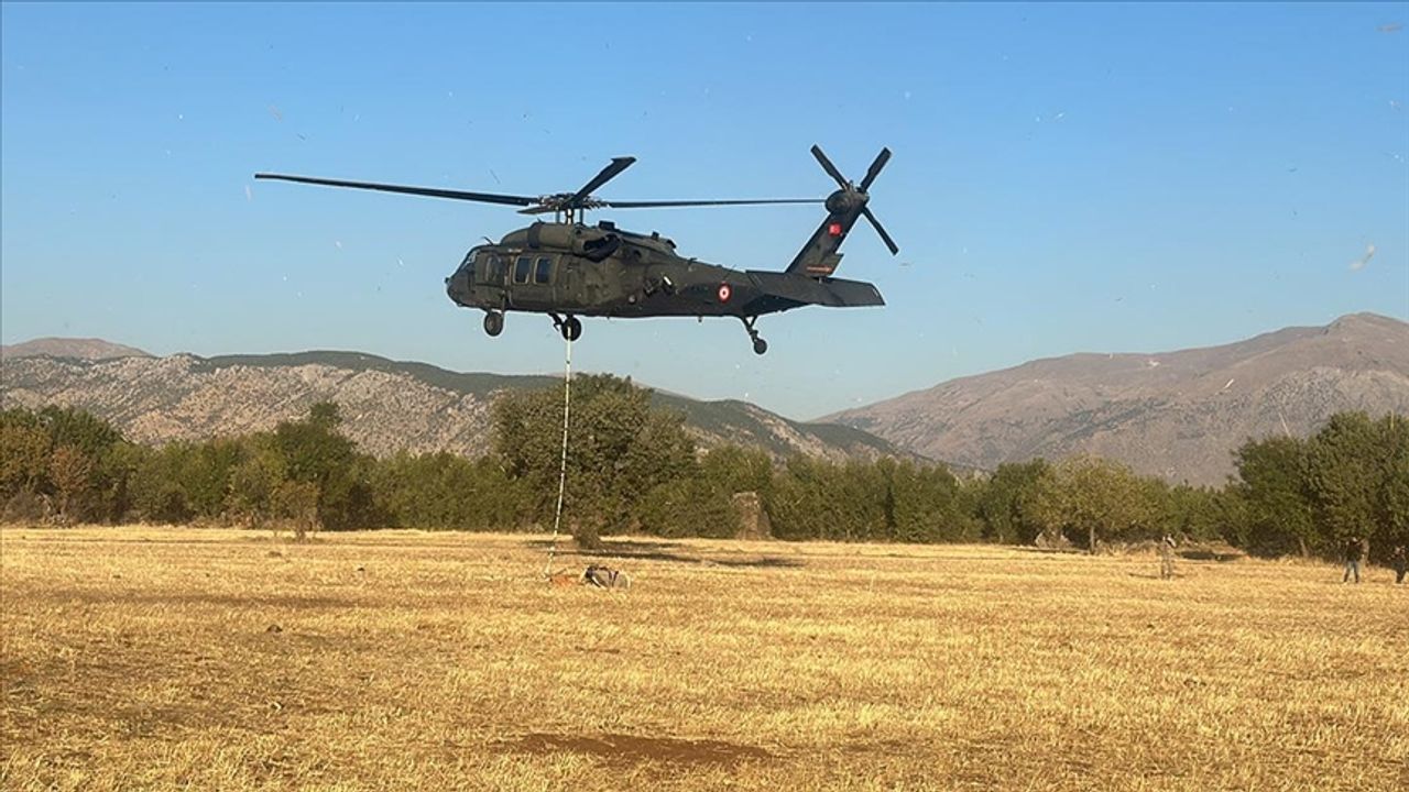 Adıyaman'da keşfedilen tarihi eserler sarp araziden askeri helikopterle taşındı