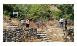 Kayıp emlakçıyı başına keserle vurup, halıya sardıktan sonra gömmüş