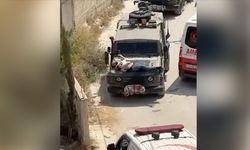 İsrail askerleri, Batı Şeria'da yaralı Filistinliyi askeri araca bağlayıp "canlı kalkan" olarak kullandı