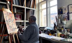 Uygur ressam, ünlü yazar Aytmatov'un eserlerini tablolara yansıttı