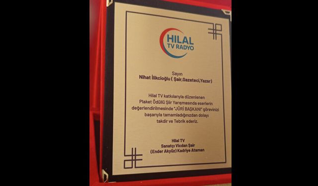 NİHAT İLİKCİOĞLU’NA PLAKET TAKDİM EDİLDİ