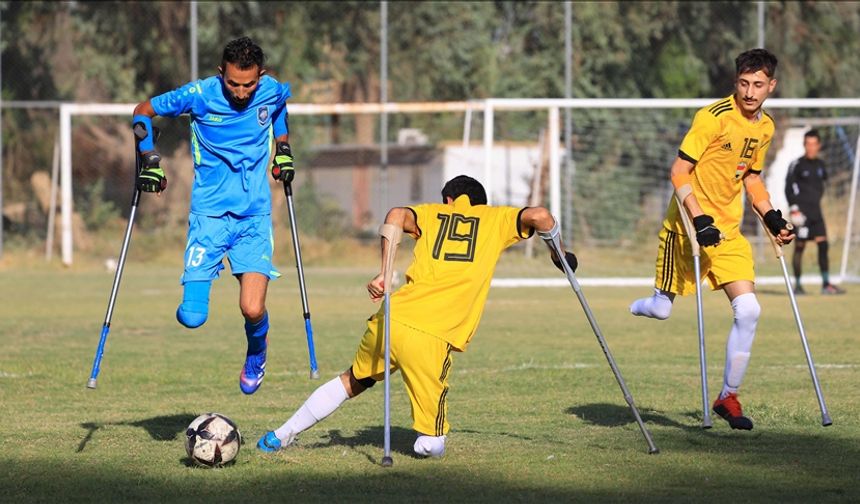 Irak'taki şiddet olaylarında uzuvlarını kaybedenler futbolla hayata tutunuyor